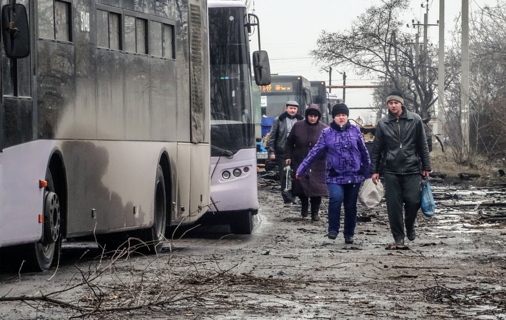 A convoy of the busses for refugees/@depositphotos