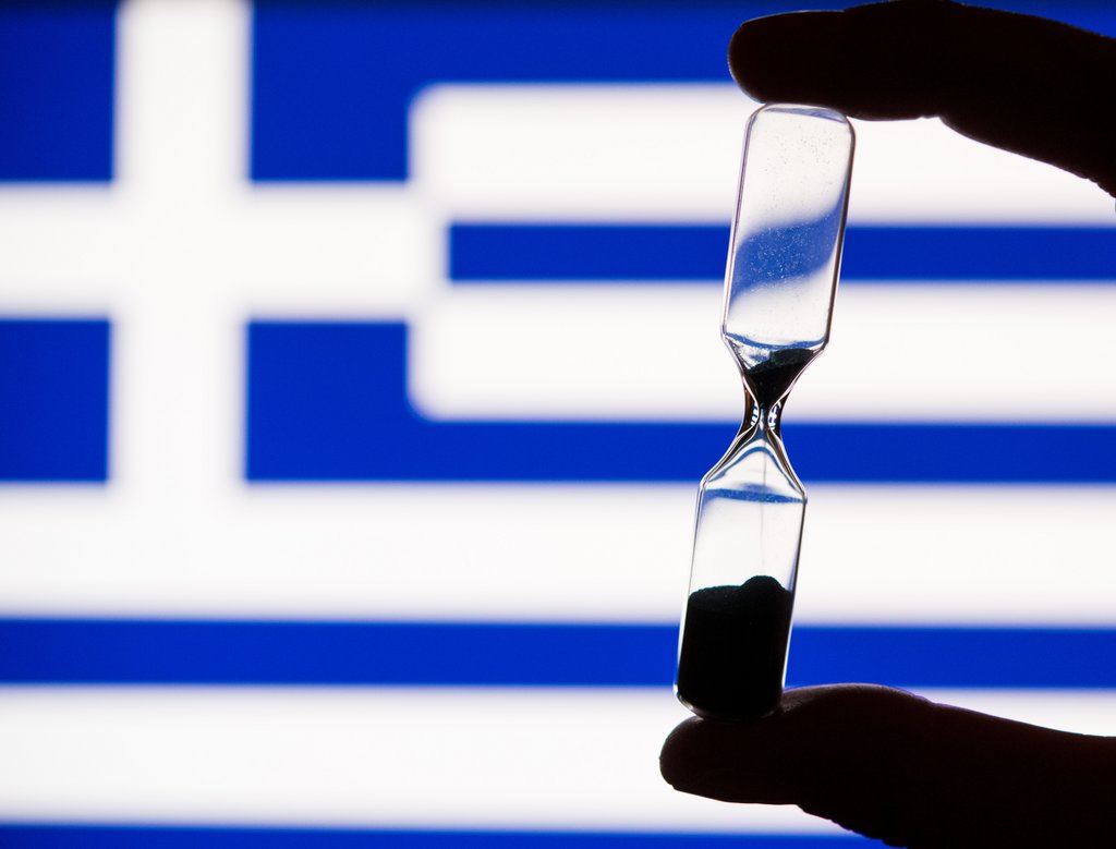 Juncker will Athen im Euro halten