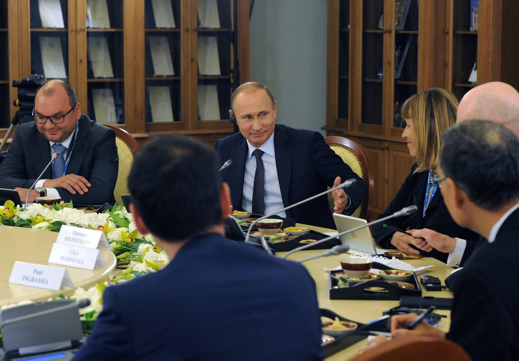 President Vladimir Putin and heads of leading international news. Foto: dpa