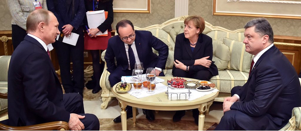 Putin, Hollande, Merkel und Poroschenko/dpa